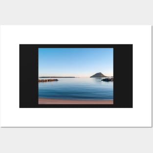 Landmark Mount Maunganui on horizon across Tauranga harbour at sunrise Posters and Art